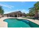 Exterior view of a house with a private pool and covered patio at 16461 W Central St, Surprise, AZ 85388