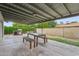 Entertain on this spacious covered back patio with an outdoor kitchen including a built-in grill at 1649 W Royal Palm Rd, Phoenix, AZ 85021