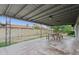 Relax on this covered back patio, perfect for outdoor dining with table and bench seating at 1649 W Royal Palm Rd, Phoenix, AZ 85021