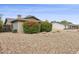 Lovely home with colorful bougainvillea bushes and a drought-tolerant rock landscape at 1649 W Royal Palm Rd, Phoenix, AZ 85021