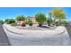 Neighborhood street corner with desert landscaping and a view of the home's exterior at 1761 N Hester Trl, Casa Grande, AZ 85122