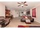 Expansive living room merging with kitchen and dining spaces, ideal for entertaining friends and Gathering at 17825 W Lincoln St, Goodyear, AZ 85338