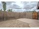 Open backyard space featuring privacy fencing and a small brick-paved patio at 1847 E Kirkland Ln # C, Tempe, AZ 85281
