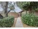 Tranquil entrance with mature trees and greenery create great curb appeal at 1847 E Kirkland Ln # C, Tempe, AZ 85281