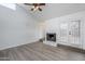 Bright living room with a marble fireplace and French doors leading to the backyard at 1847 E Kirkland Ln # C, Tempe, AZ 85281