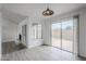 View of living room fireplace and access to backyard through a sliding glass door at 1847 E Kirkland Ln # C, Tempe, AZ 85281