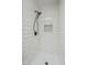 Close-up of shower with subway tile, dark hardware, and built-in niche at 1847 E Kirkland Ln # C, Tempe, AZ 85281