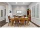 Charming dining room with a farmhouse-style table and seating for six at 2045 E San Carlos Pl, Chandler, AZ 85249