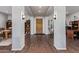 Spacious foyer with hardwood floors, decorative lighting, and views into multiple rooms enhancing the home's welcoming appeal at 2045 E San Carlos Pl, Chandler, AZ 85249