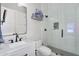 Modern bathroom with white subway tile, frameless shower, and marble vanity at 20644 E Sunrise Ct, Queen Creek, AZ 85142