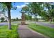 A clock tower overlooks the lushly landscaped walking path through the community at 20644 E Sunrise Ct, Queen Creek, AZ 85142