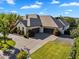 Stunning home featuring a spacious driveway, manicured lawn, and a charming exterior at 20644 E Sunrise Ct, Queen Creek, AZ 85142