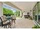 Inviting outdoor patio with comfortable seating and a view of the pool and backyard at 20644 E Sunrise Ct, Queen Creek, AZ 85142