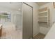 Bathroom view with closet and walk in shower near window at 20986 N 66Th Ln, Glendale, AZ 85308