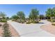 Sidewalk intersection in a community park with desert landscaping and walking paths at 23179 S 225Th Pl, Queen Creek, AZ 85142