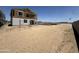 Newly constructed home with partial exterior and wide open space around it at 2351 E Homesteader Rd, San Tan Valley, AZ 85140
