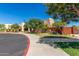 Attractive commercial building with a mix of stone and stucco, enhanced by mature trees and green landscaping at 2368 E Bellerive Dr, Gilbert, AZ 85298