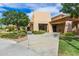 Attractive building with stone and stucco accents, surrounded by manicured landscaping and a well-kept lawn at 2368 E Bellerive Dr, Gilbert, AZ 85298