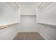 Walk-in closet with built-in shelving at 2368 E Bellerive Dr, Gilbert, AZ 85298