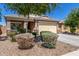 Well-maintained single-story home with desert landscaping, stone accents, and a two-car garage in a quiet neighborhood at 2368 E Bellerive Dr, Gilbert, AZ 85298