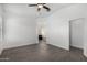 Bright Main bedroom featuring wood-style flooring and an ensuite bathroom at 2368 E Bellerive Dr, Gilbert, AZ 85298