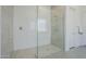 Contemporary shower with sleek glass enclosure and modern tile design at 24000 S 218Th Pl, Queen Creek, AZ 85142