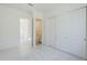 Bright bedroom with closet and nearby ensuite bathroom at 24000 S 218Th Pl, Queen Creek, AZ 85142