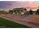 Stunning community picnic pavilion surrounded by manicured landscaping and walking paths at 24000 S 218Th Pl, Queen Creek, AZ 85142