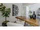 A modern home office space featuring a wooden desk, stylish decor, and comfortable seating at 24000 S 218Th Pl, Queen Creek, AZ 85142