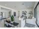 A bright living room with modern furniture, stylish decor, and a welcoming atmosphere at 24000 S 218Th Pl, Queen Creek, AZ 85142