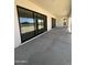 Covered patio with large sliding glass doors providing a seamless indoor-outdoor transition at 24000 S 218Th Pl, Queen Creek, AZ 85142