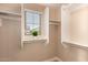Closet with window and built in shelves at 26521 N Babbling Brook Dr, Phoenix, AZ 85083