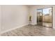 Versatile room with sliding glass door access to the backyard, perfect for office or den at 26521 N Babbling Brook Dr, Phoenix, AZ 85083