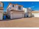 Two-car garage featuring a brick paver driveway and extra parking at 26521 N Babbling Brook Dr, Phoenix, AZ 85083