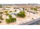 This bird's-eye view of the desert home highlights lush trees and extensive land, creating an ideal retreat setting at 27347 N Gary Rd, San Tan Valley, AZ 85144