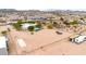 Overhead perspective of a desert property, highlighting a pool and ample land, presenting unique potential at 27347 N Gary Rd, San Tan Valley, AZ 85144
