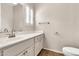 Well-lit bathroom featuring a white vanity and tile floors, providing a clean and functional space at 27347 N Gary Rd, San Tan Valley, AZ 85144