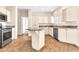 Beautiful kitchen with a center island, stainless steel appliances, and ample cabinet space at 27347 N Gary Rd, San Tan Valley, AZ 85144