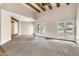 Expansive living room with lots of natural light and carpeted floors at 27347 N Gary Rd, San Tan Valley, AZ 85144