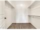 A walk-in closet with shelving and neutral carpeting at 27347 N Gary Rd, San Tan Valley, AZ 85144