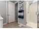 Elegant bathroom featuring a glass-enclosed shower and decorative artwork at 32582 N Durango Ln, San Tan Valley, AZ 85143