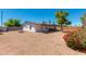 Spacious backyard with a patio area and potential for various outdoor activities and landscaping at 343 S Cholla St, Gilbert, AZ 85233