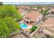 Aerial view showcases the pool, outdoor living space, and proximity to community amenities at 4043 N Ranier --, Mesa, AZ 85215