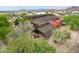 Unique house design with modern architectural elements and natural landscaping at 4043 N Ranier --, Mesa, AZ 85215