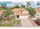 Charming two-story home boasts lush landscaping, a well-manicured lawn, and a welcoming two car garage at 4043 N Ranier --, Mesa, AZ 85215