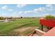 Scenic golf course view with water feature and desert landscaping at 4043 N Ranier --, Mesa, AZ 85215