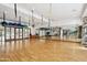 Bright gym area features wood floors, mirrors and workout equipment at 4043 N Ranier --, Mesa, AZ 85215