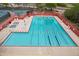 Large community pool with swimming lanes, lounge chairs, and a relaxing hot tub at 4043 N Ranier --, Mesa, AZ 85215