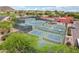 Community tennis and pickleball courts with a swimming pool, perfect for recreation at 4043 N Ranier --, Mesa, AZ 85215