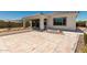 Spacious backyard with tile patio, outdoor kitchen, and manicured landscaping at 4051 S Galaxy Ln, Mesa, AZ 85212